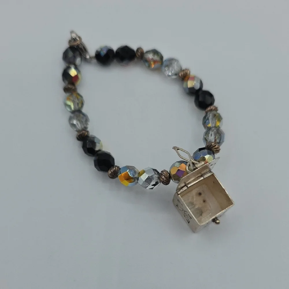 Elegant Black and Gold Charm Bracelet